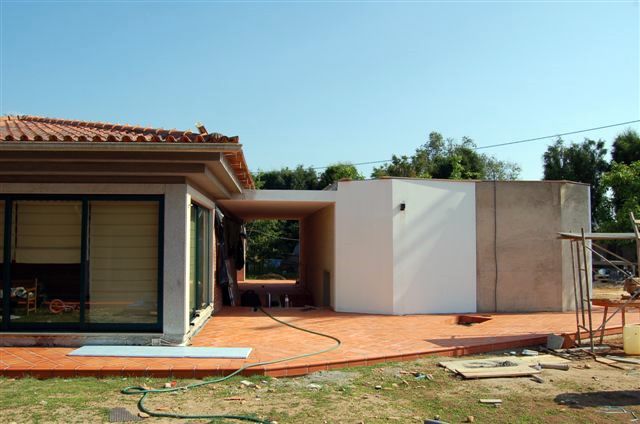 11.Final do reboco e in�cio da pintura das paredes exteriores